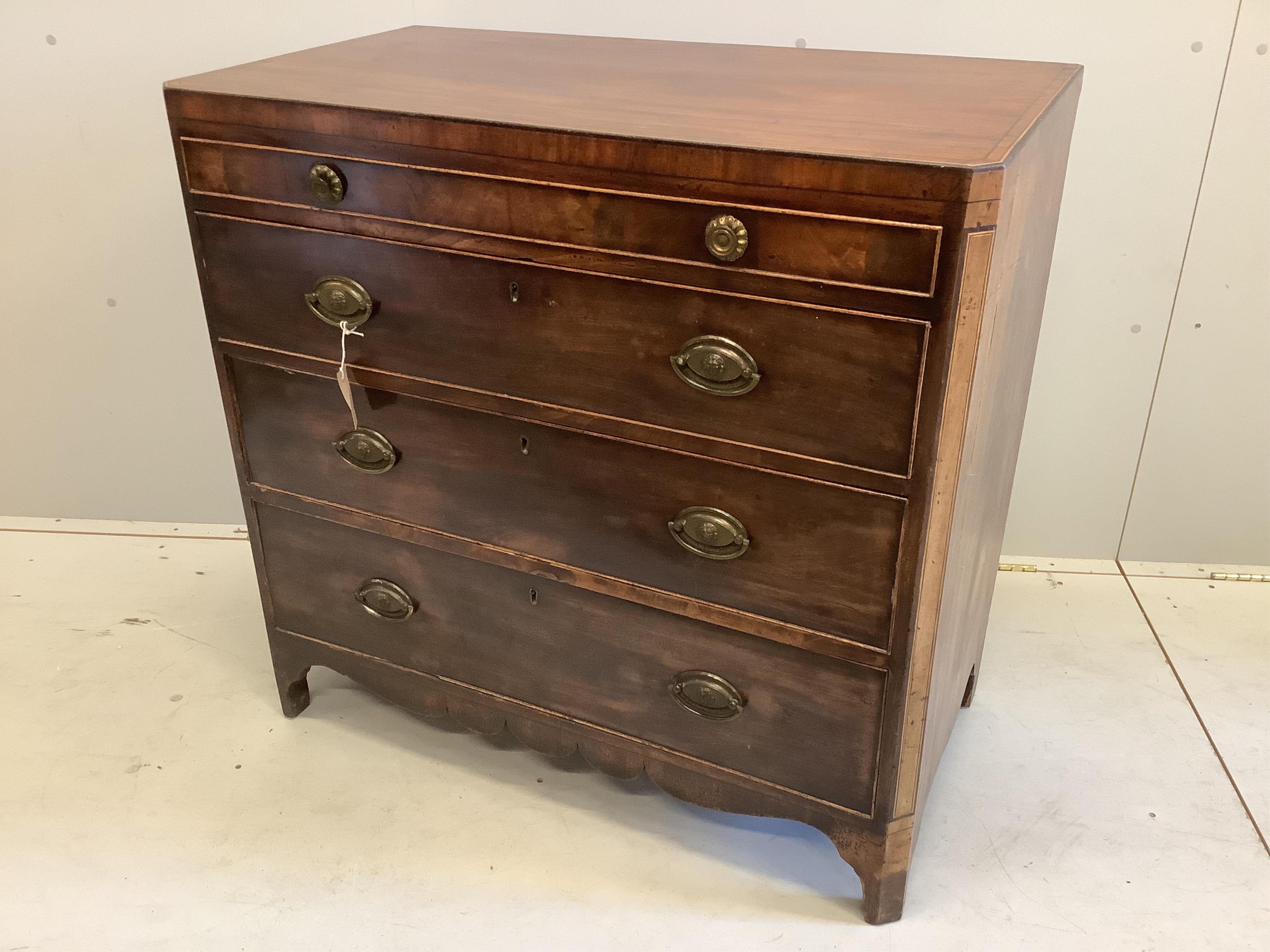 A George IV banded mahogany dressing chest, the fitted drawer with baize lined sliding surface and adjustable easel mirror, width 95cm, depth 51cm, height 92cm. Condition - fair